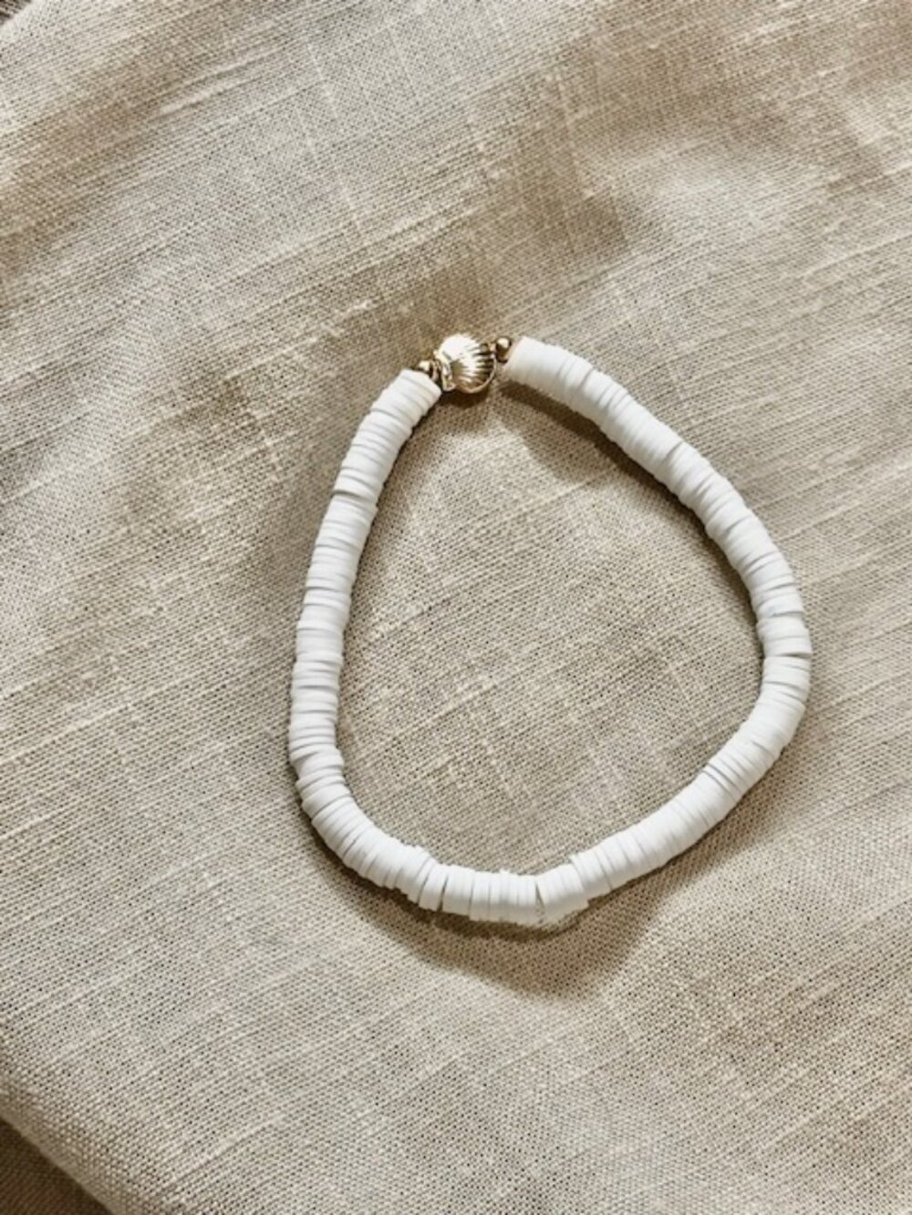 Heishi Bead Stretch Bracelet with Seashell Charm Gold Plated Accents White